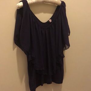 Purple tee with sheer overlay.